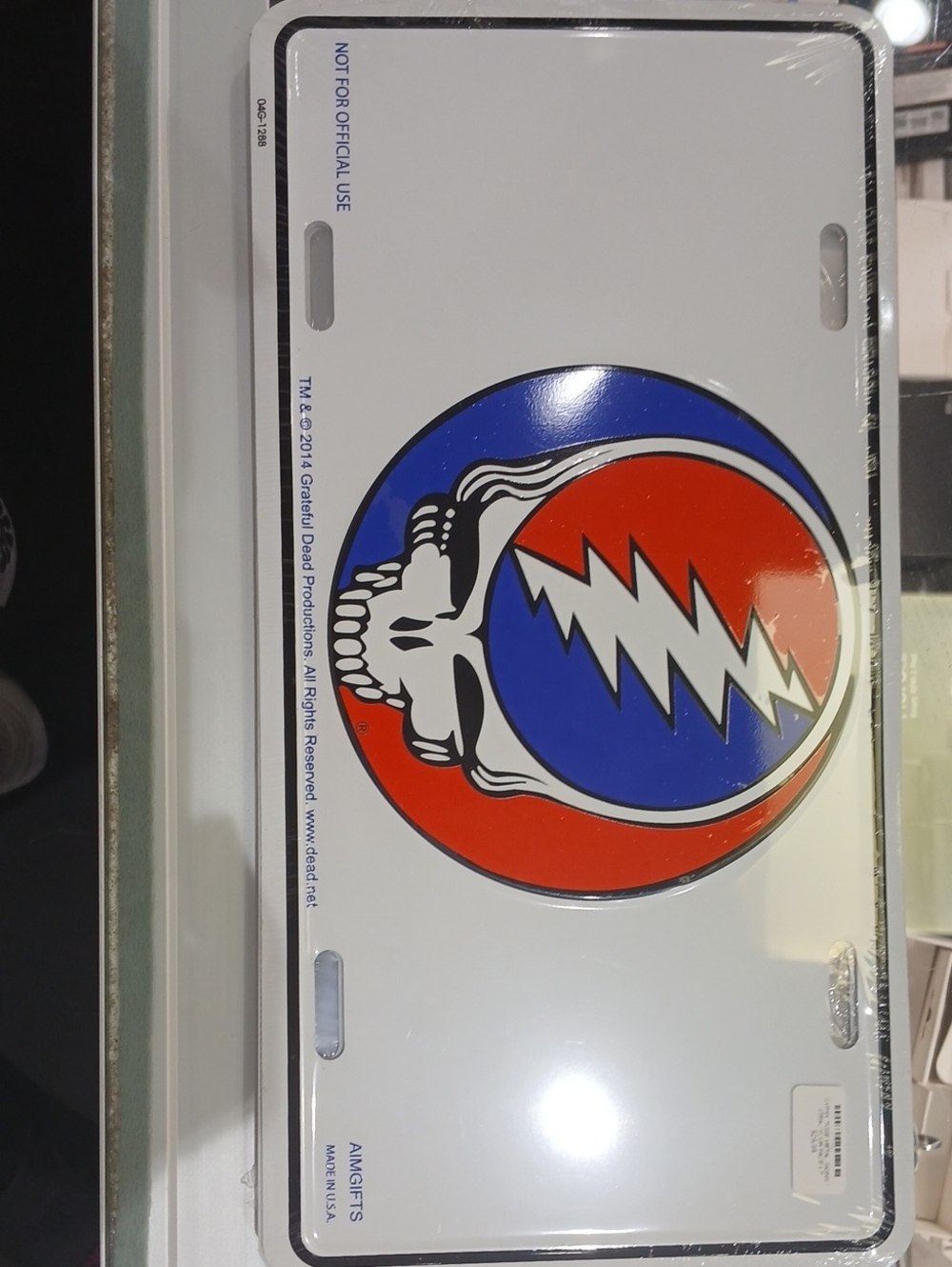 RARE Grateful Dead red, blue, white skull lightning license plate